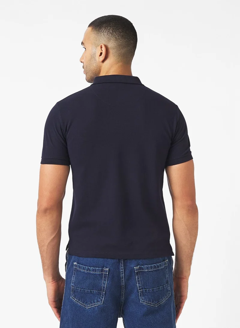 سفنتي فايف قميص بولو بأزرار